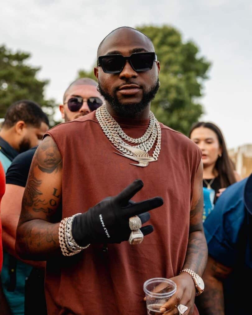 Davido reacts after a lady shared a video of someone driving his lambo