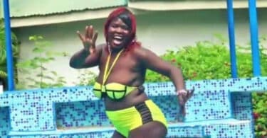 Singer Mercy Atis strips naked after her brothel was raided by police (Videos)