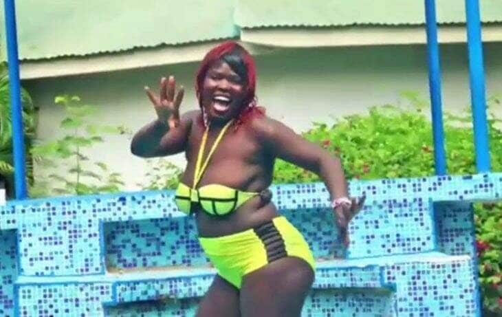 Singer Mercy Atis strips naked after her brothel was raided by police (Videos)