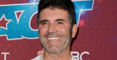 Simon Cowell says he began drinking and smoking at 8 and was arrested at 12