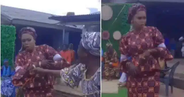 Bride blows hot at guest who used the money to wipe her face, rejects the money (Video)