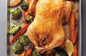 Lemon & garlic roast chicken with charred broccoli & sweet potato mash Recipe