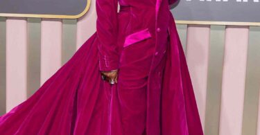 Billy Porter Attended The 2023 Golden Globes In A Gorge Magenta Tuxedo Dress