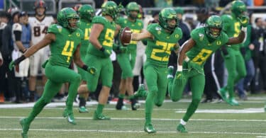 Oregon Triumphs Over Oregon State 31-7