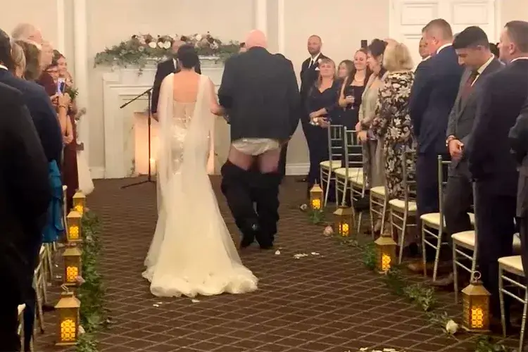 Bride Issues Humorous Warning After Dad's Pants Mishap at Her Wedding